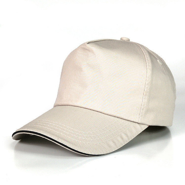 Custom embroidered baseball caps in white cotton design with white accents, perfect for branding and promotional events.