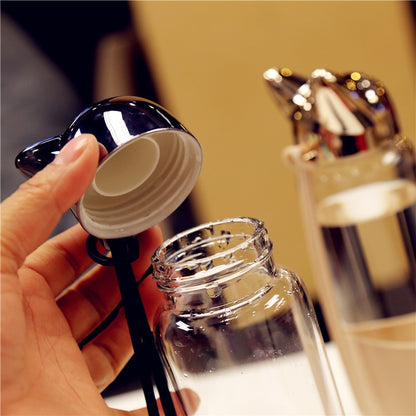 Glass water bottle with sleeve for outdoor activities