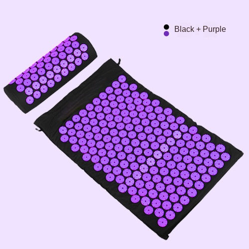 Acupressure mat and pillow set in black and purple for massage and yoga relaxation.