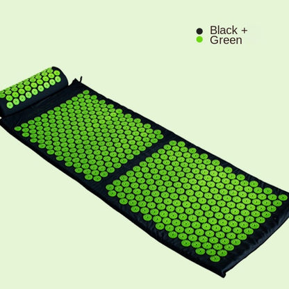 Acupressure mat and pillow set in black and green colors for massage and yoga relaxation.